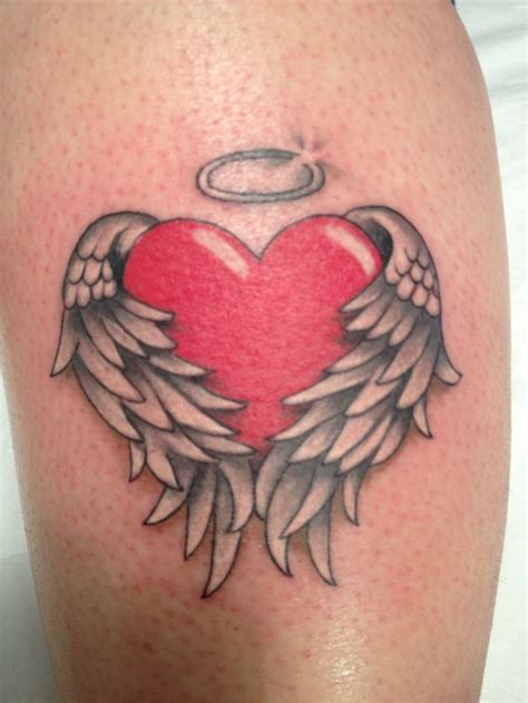 angel with heart tattoo|More.